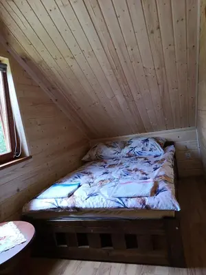 Łóżko lub łóżka w pokoju w obiekcie Janowickie Zacisze