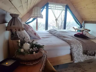 Łóżko lub łóżka w pokoju w obiekcie Pod Aniołem 2
