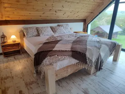 Łóżko lub łóżka w pokoju w obiekcie Pod Aniołem 2