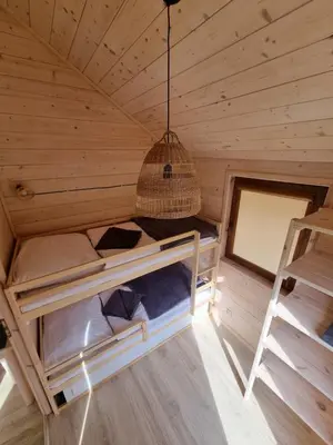Łóżko lub łóżka w pokoju w obiekcie Domek pod Szczelińcem