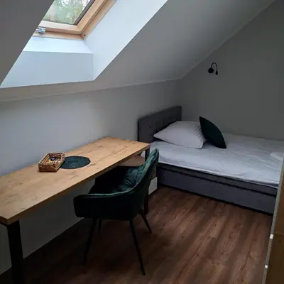 Łóżko lub łóżka w pokoju w obiekcie Karłowy Las
