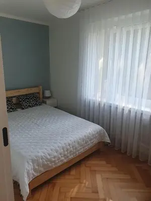 Łóżko lub łóżka w pokoju w obiekcie Opawska koliba