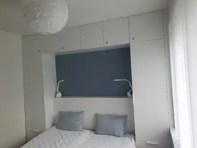 Łóżko lub łóżka w pokoju w obiekcie Opawska koliba