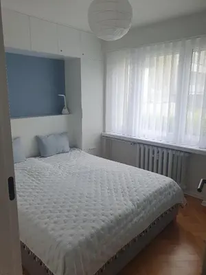 Łóżko lub łóżka w pokoju w obiekcie Opawska koliba
