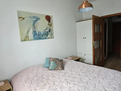 Łóżko lub łóżka w pokoju w obiekcie Apartament 16 - Bliżej Zdroju