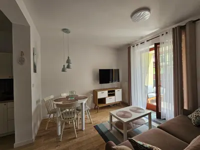 Telewizja i/lub zestaw kina domowego w obiekcie Apartament 16 - Bliżej Zdroju