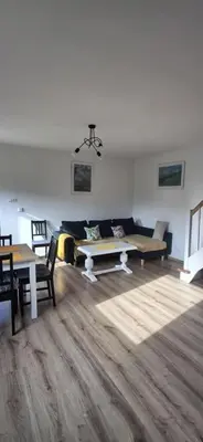Część wypoczynkowa w obiekcie Domek w ogródku
