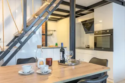 Kuchnia lub aneks kuchenny w obiekcie Apartament z antresolą Nowa Papiernia