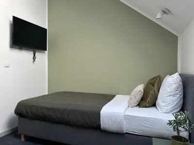 Telewizja i/lub zestaw kina domowego w obiekcie Moment