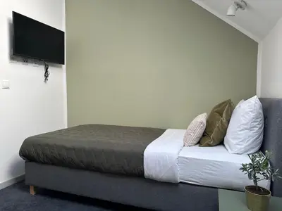 Telewizja i/lub zestaw kina domowego w obiekcie Moment