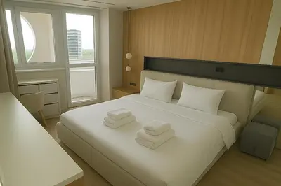 Łóżko lub łóżka w pokoju w obiekcie Kultowy apartament z Widokiem