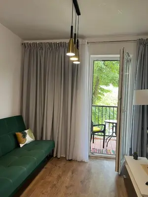 Część wypoczynkowa w obiekcie Apartament Giulia z balkonem