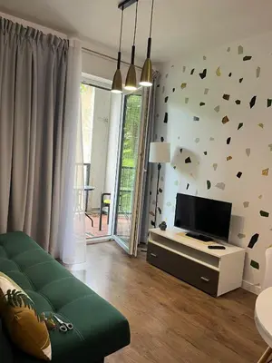 Telewizja i/lub zestaw kina domowego w obiekcie Apartament Giulia z balkonem