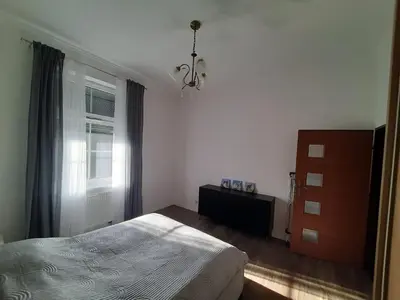 Łóżko lub łóżka w pokoju w obiekcie Apartament GALERIA