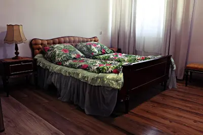 Łóżko lub łóżka w pokoju w obiekcie Hotel Dworek