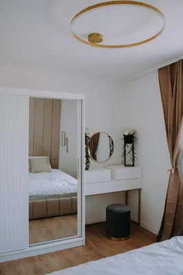 Łóżko lub łóżka w pokoju w obiekcie SowaSMART Apartament z sauną