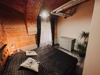 Łóżko lub łóżka w pokoju w obiekcie Apartament w Twierdzy