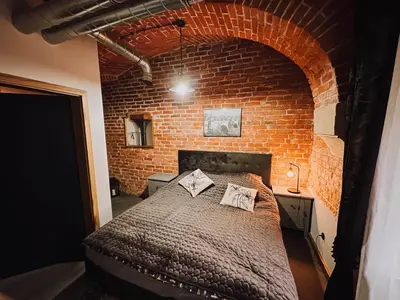 Łóżko lub łóżka w pokoju w obiekcie Apartament w Twierdzy