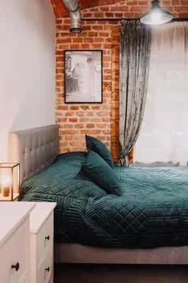 Łóżko lub łóżka w pokoju w obiekcie Apartament w Twierdzy