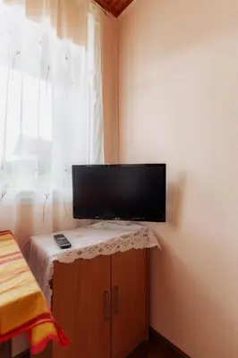 Telewizja i/lub zestaw kina domowego w obiekcie Domki letniskowe OWRAC