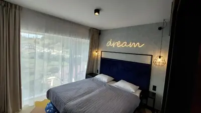 Łóżko lub łóżka w pokoju w obiekcie Apartament Biała Perła Czarna Góra Resort