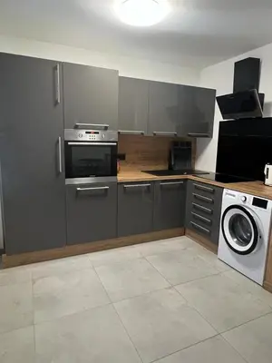 Kuchnia lub aneks kuchenny w obiekcie Apartament pod ŚWIERKIEM