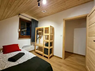 Łóżko lub łóżka w pokoju w obiekcie Dom w Rudawie