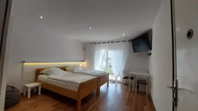 Łóżko lub łóżka w pokoju w obiekcie Hotel Konty Self-Service