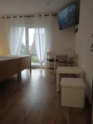 Telewizja i/lub zestaw kina domowego w obiekcie Hotel Konty Self-Service