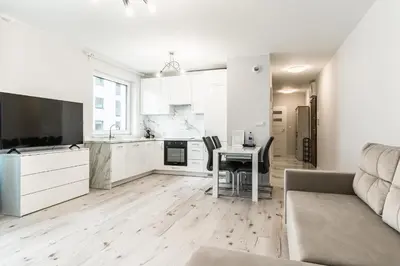 Telewizja i/lub zestaw kina domowego w obiekcie Pure Rental Premium Apartments - Free Parking & AC