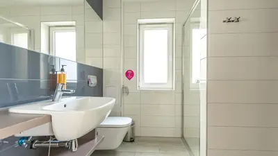 Łazienka w obiekcie VacationClub - Ischgl Apartament 11