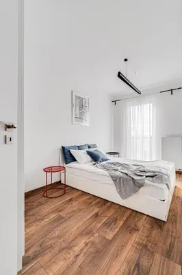 Łóżko lub łóżka w pokoju w obiekcie Prime Time Apartament - 24h check -in - Parking w cenie