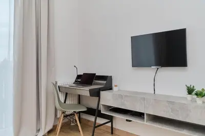 Telewizja i/lub zestaw kina domowego w obiekcie Modern Studio Słonimskiego with Balcony by Noclegi Renters