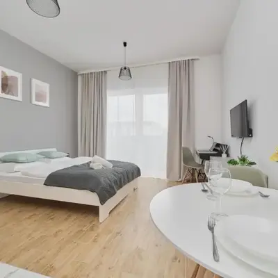 Modern Studio Słonimskiego with Balcony by Noclegi Renters