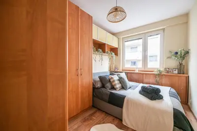 Łóżko lub łóżka w pokoju w obiekcie NiceOne Apartment Number 3 - W samym Centrum! AC
