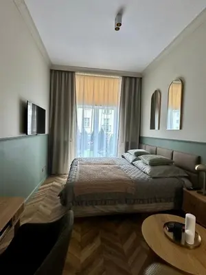 Łóżko lub łóżka w pokoju w obiekcie Apartament OPAL Mickiewicza