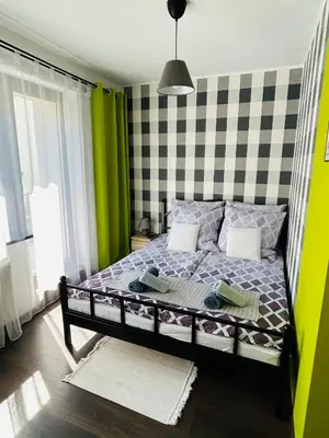 Łóżko lub łóżka w pokoju w obiekcie Na Turystycznej-apartamenty i pokoje w sercu uzdrowiska