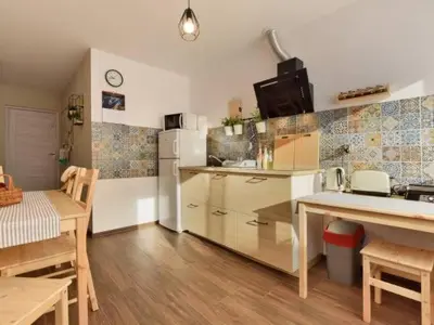 Kuchnia lub aneks kuchenny w obiekcie Na Turystycznej-apartamenty i pokoje w sercu uzdrowiska