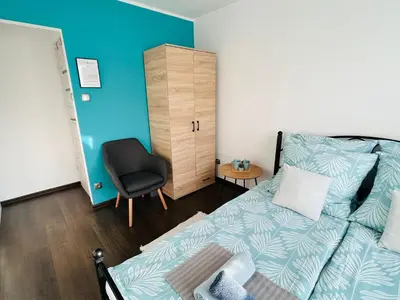Łóżko lub łóżka w pokoju w obiekcie Na Turystycznej-apartamenty i pokoje w sercu uzdrowiska