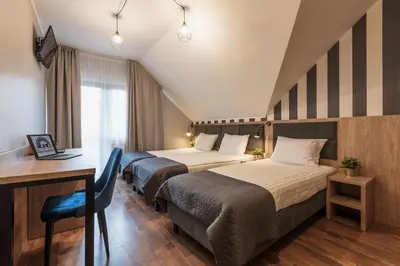 Łóżko lub łóżka w pokoju w obiekcie Złote Góry - Czarna Góra