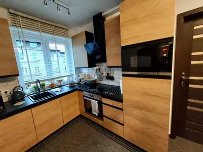 Kuchnia lub aneks kuchenny w obiekcie AuroraBoguszow