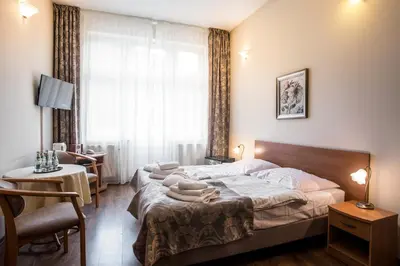 Łóżko lub łóżka w pokoju w obiekcie Jan Kazimierz