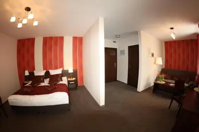 Łóżko lub łóżka w pokoju w obiekcie Hotel Kosmonauty Wrocław-Airport