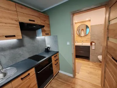 Kuchnia lub aneks kuchenny w obiekcie Apartament Mała Twierdza