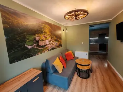 Telewizja i/lub zestaw kina domowego w obiekcie Apartament Mała Twierdza
