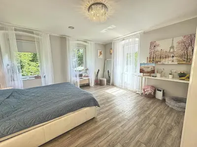 Łóżko lub łóżka w pokoju w obiekcie Stylowy Apartament w sercu Uzdrowiska