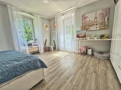 Łóżko lub łóżka w pokoju w obiekcie Stylowy Apartament w sercu Uzdrowiska
