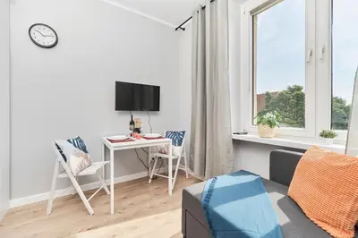 Telewizja i/lub zestaw kina domowego w obiekcie Studios Wrocław Museum Square by Noclegi Renters