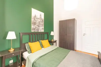 Łóżko lub łóżka w pokoju w obiekcie Wyjątkowy Apartament na Rynku