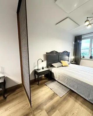 Łóżko lub łóżka w pokoju w obiekcie Apartament Antracytowe Wrota